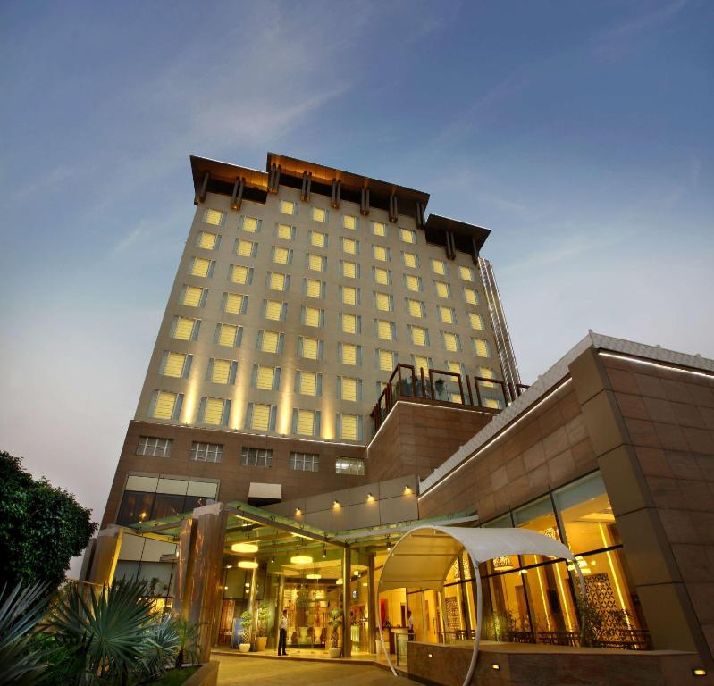 a hotel building with a canopy in front of it at Park Plaza Shahdara in New Delhi