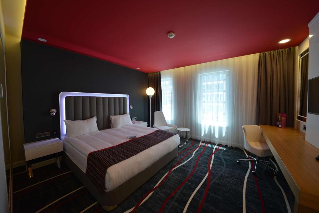 Postel nebo postele na pokoji v ubytování Park Inn by Radisson Ankara Cankaya