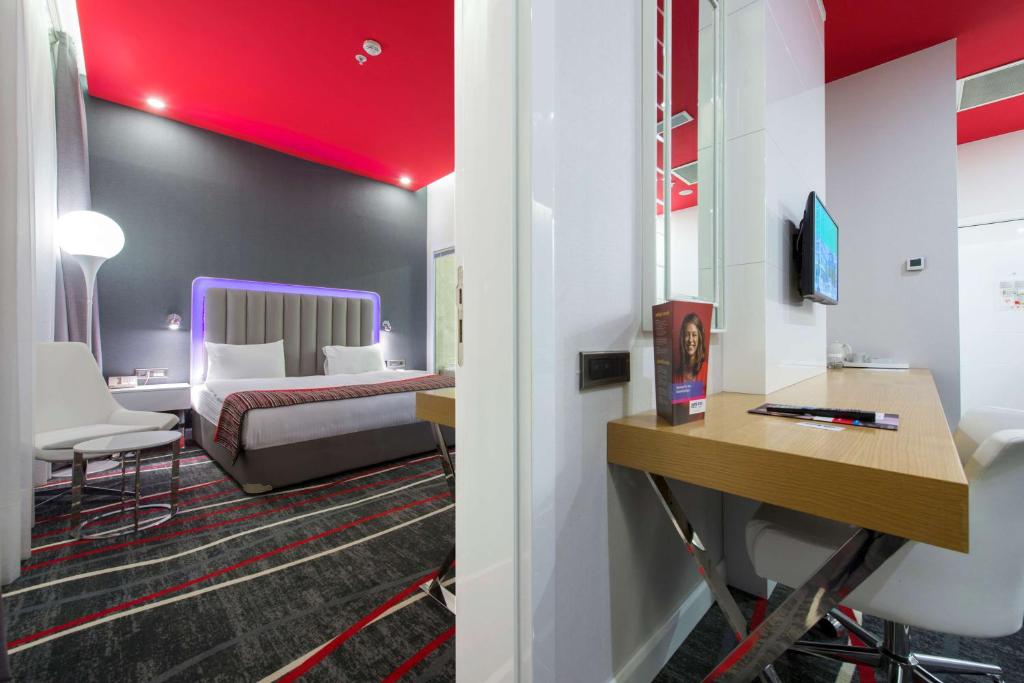 Postel nebo postele na pokoji v ubytování Park Inn by Radisson Ankara Cankaya