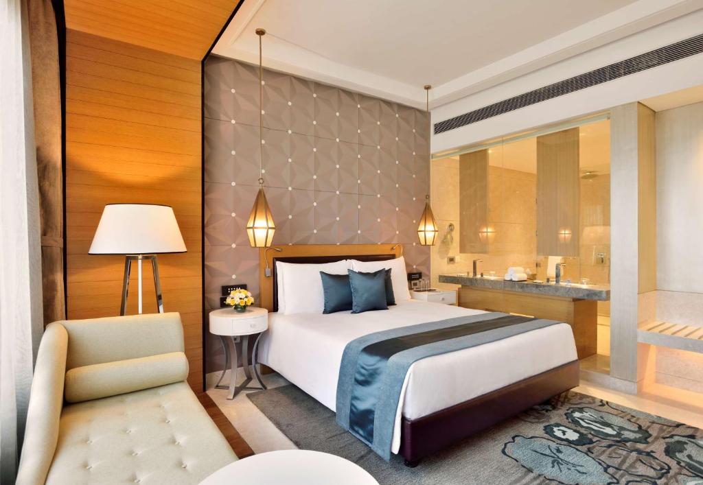 Postel nebo postele na pokoji v ubytování Radisson Blu Coimbatore