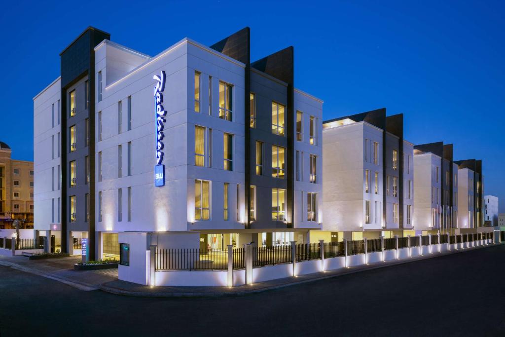 a rendering of a building at night at Radisson Blu Residence, Dhahran in Al Khobar