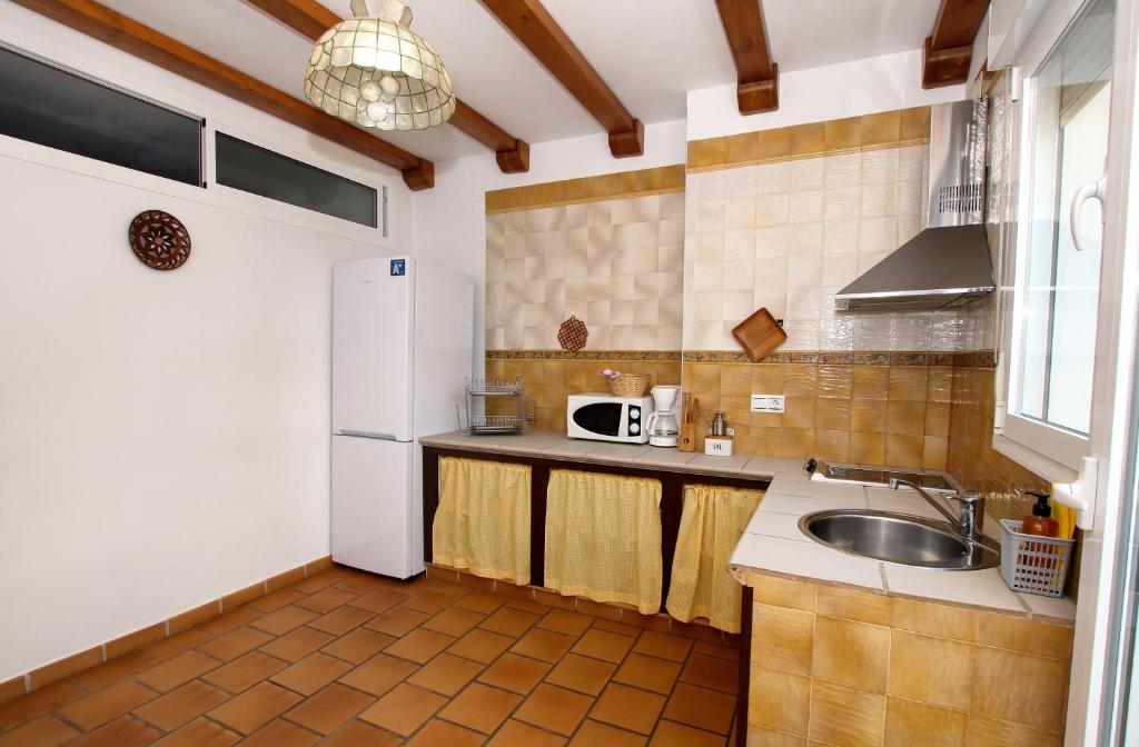 Kuchyň nebo kuchyňský kout v ubytování casa del gastronomo