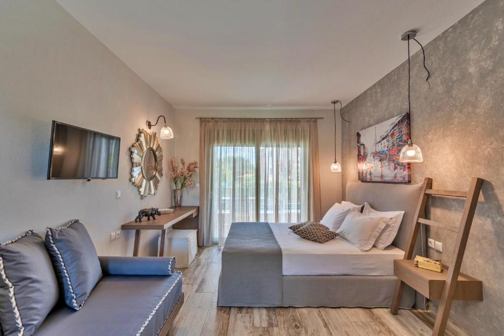 TV a/nebo společenská místnost v ubytování Alegria Suites