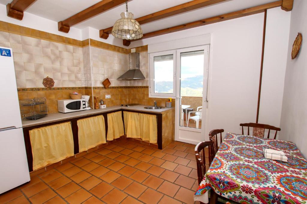 Kuchyň nebo kuchyňský kout v ubytování casa del gastronomo