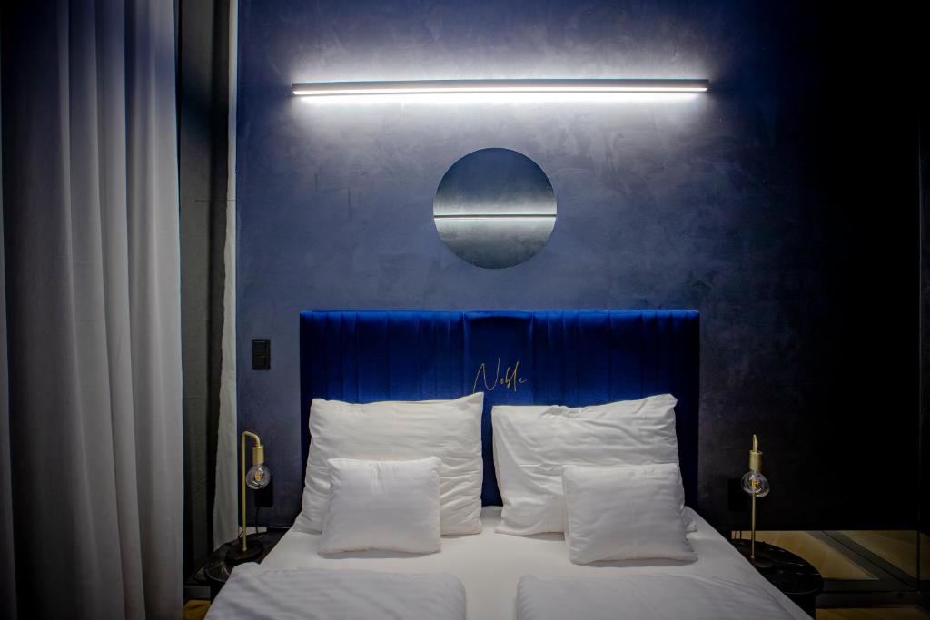 Postel nebo postele na pokoji v ubytování Noble Boutique Hotel - Adults Only