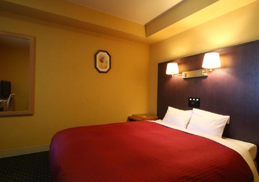 Lova arba lovos apgyvendinimo įstaigoje Sapporo Classe Hotel / Vacation STAY 63023