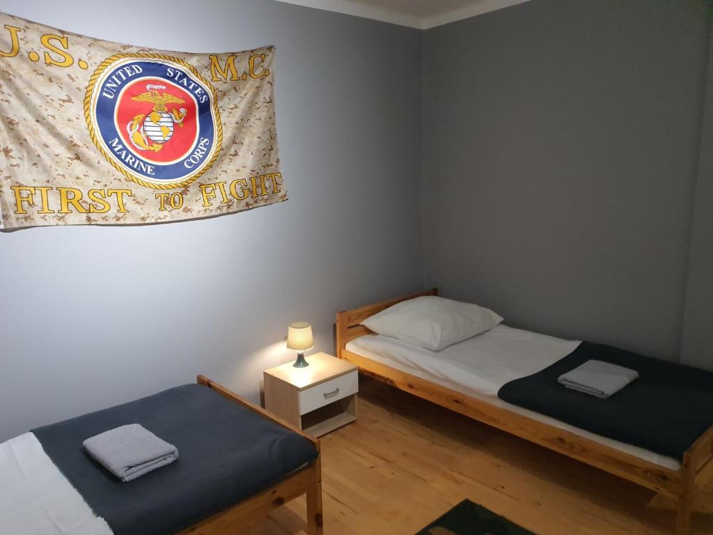 Posteľ alebo postele v izbe v ubytovaní Ośrodek VolfCamp Kwaszenina