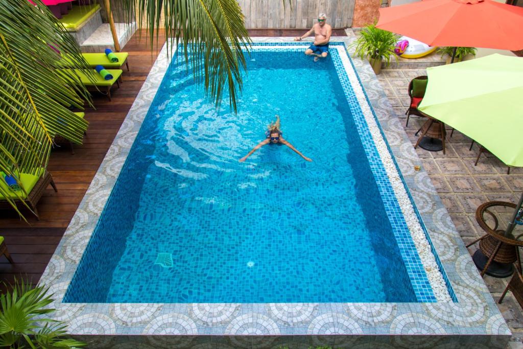 Bazén v ubytování Rosy Villa Hotel nebo v jeho okolí