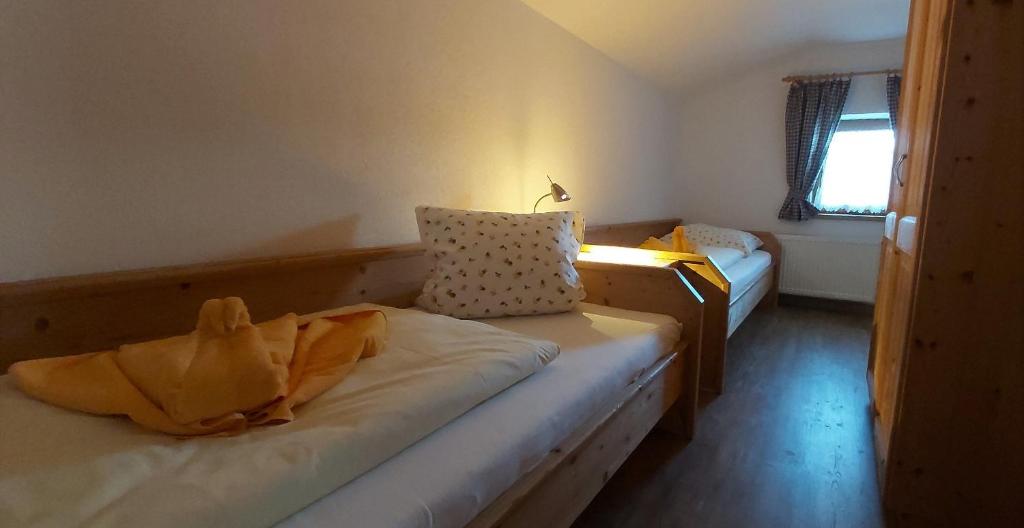 Postel nebo postele na pokoji v ubytování Romantikferienhaus am Brändle