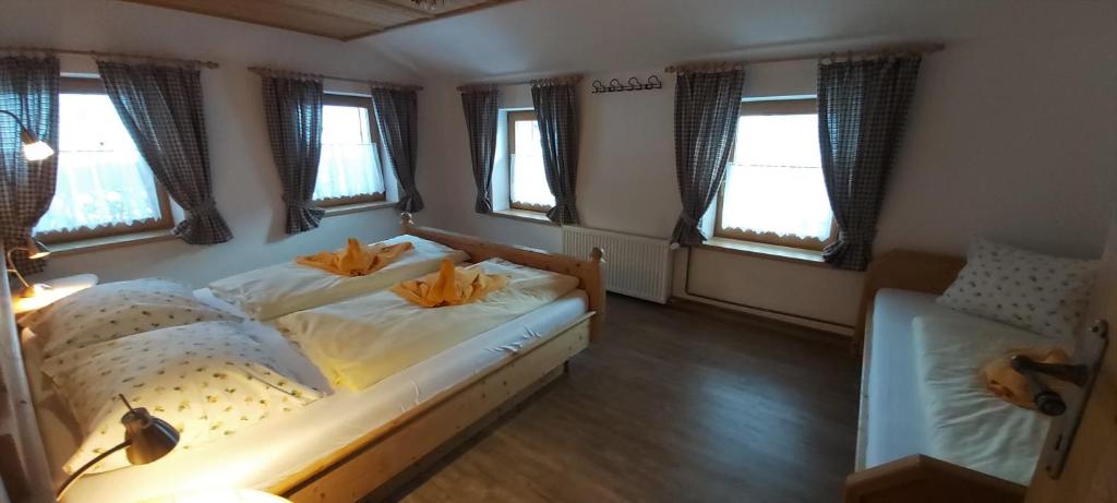 Postel nebo postele na pokoji v ubytování Romantikferienhaus am Brändle