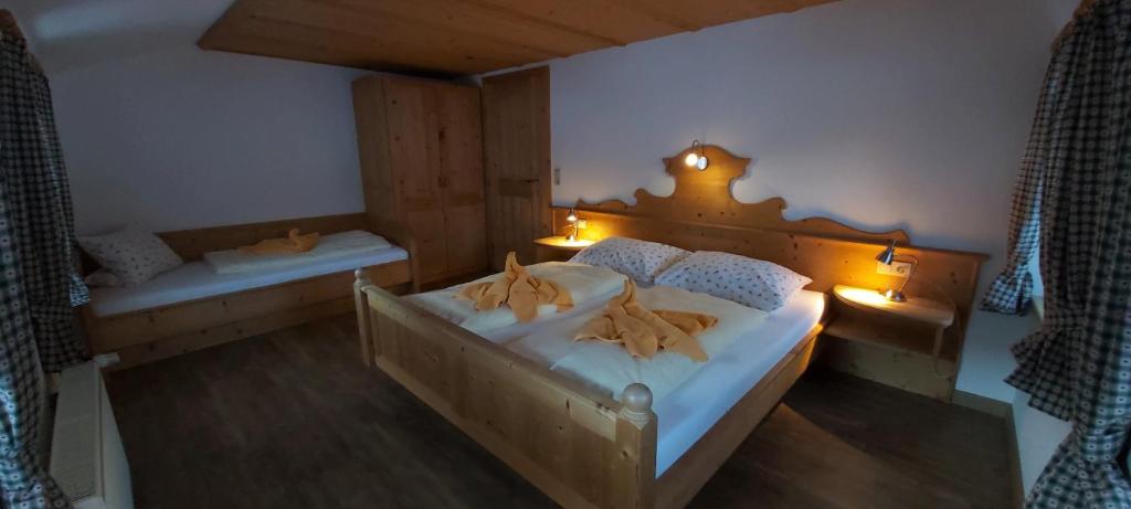 Postel nebo postele na pokoji v ubytování Romantikferienhaus am Brändle