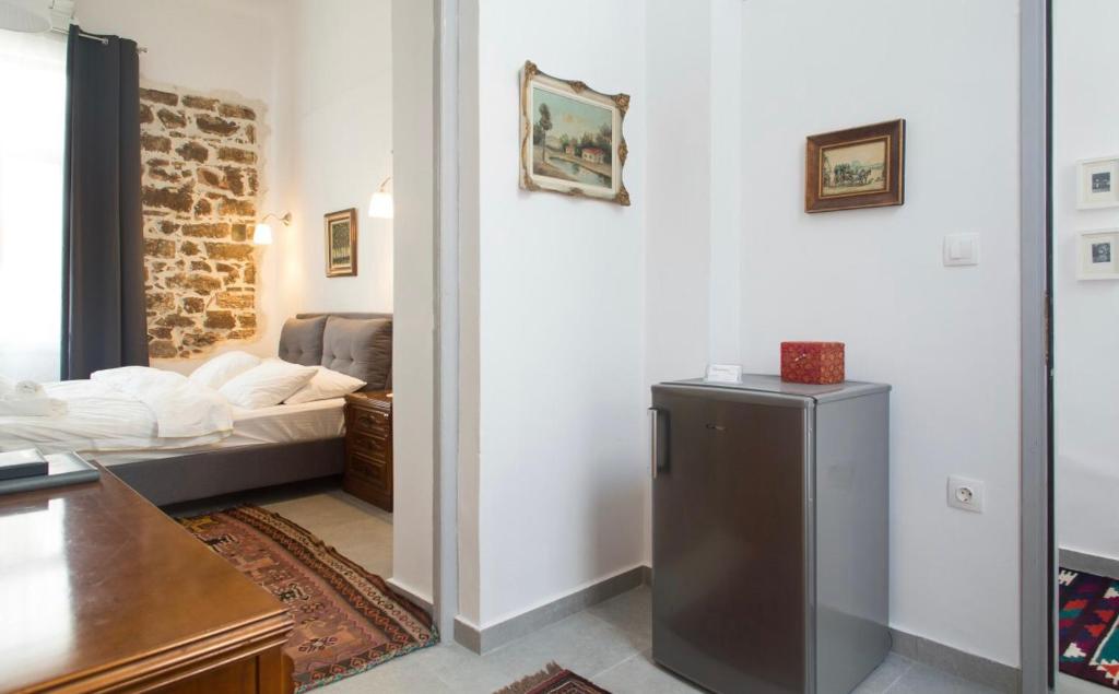 Postel nebo postele na pokoji v ubytování A litte Taste of Home Guest House
