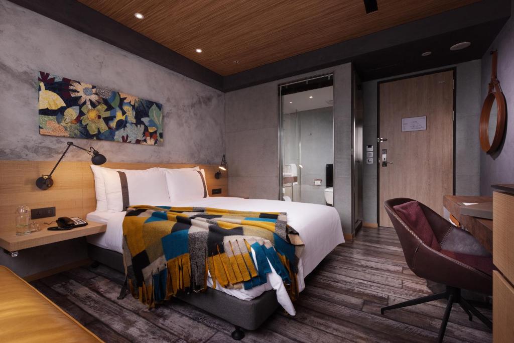 Postel nebo postele na pokoji v ubytování Brio Hotel
