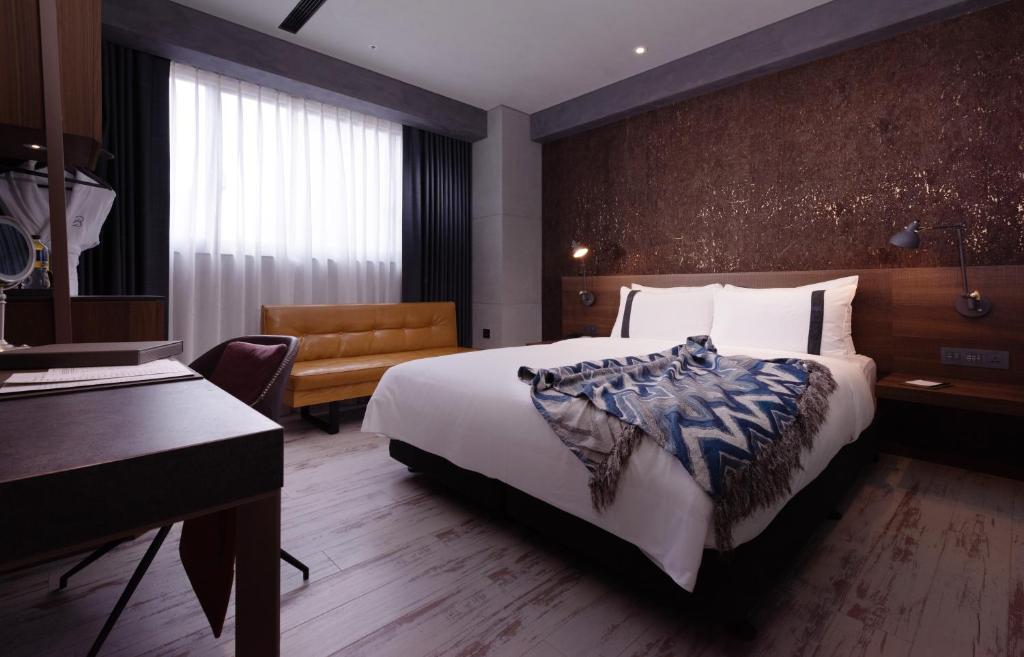Postel nebo postele na pokoji v ubytování Brio Hotel