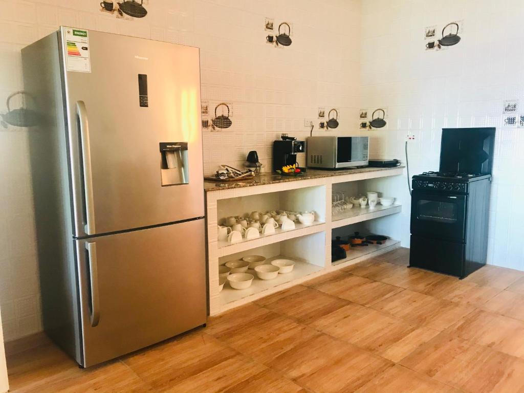 Kuchyň nebo kuchyňský kout v ubytování Villa Des Flots