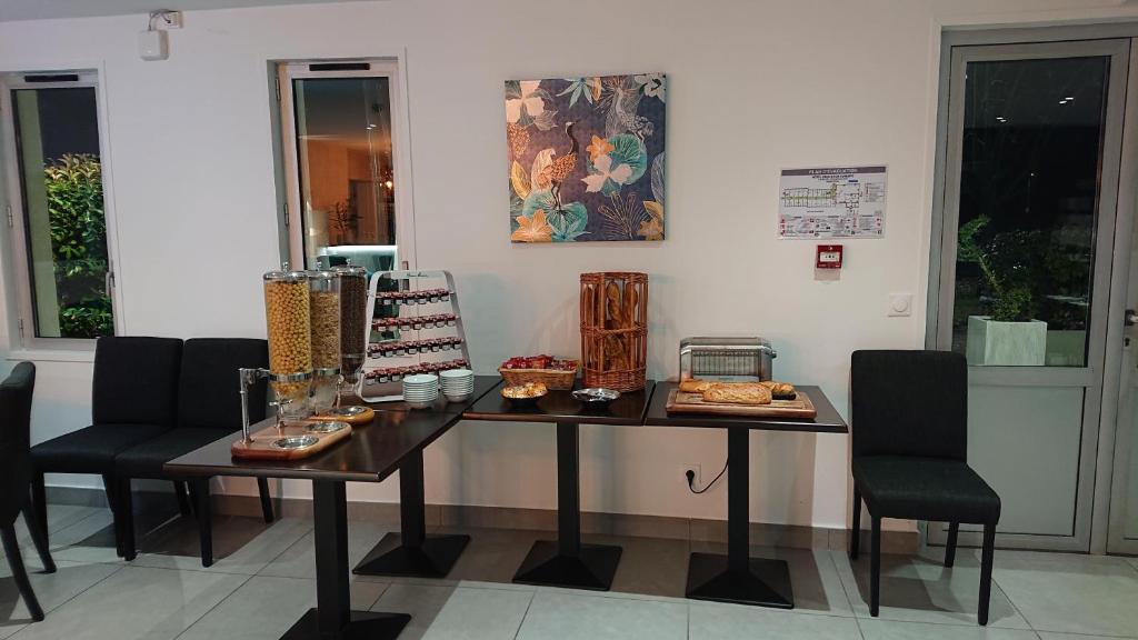 Posezení v ubytování Kyriad Direct Bron Lyon Eurexpo