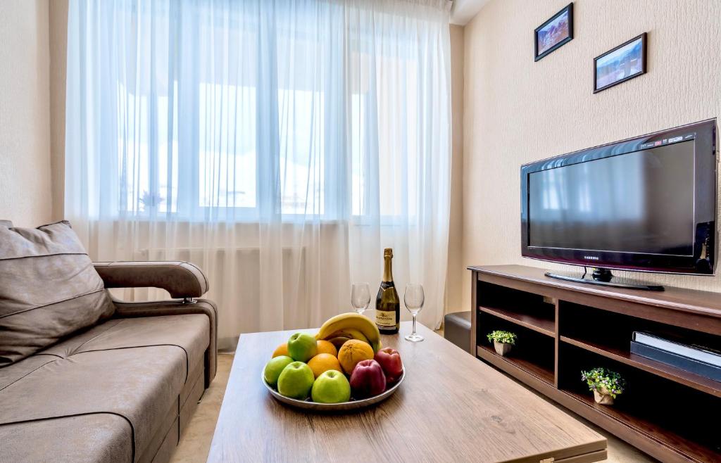 TV a/nebo společenská místnost v ubytování 2-room Apartment NFT Gudauri Penta 503