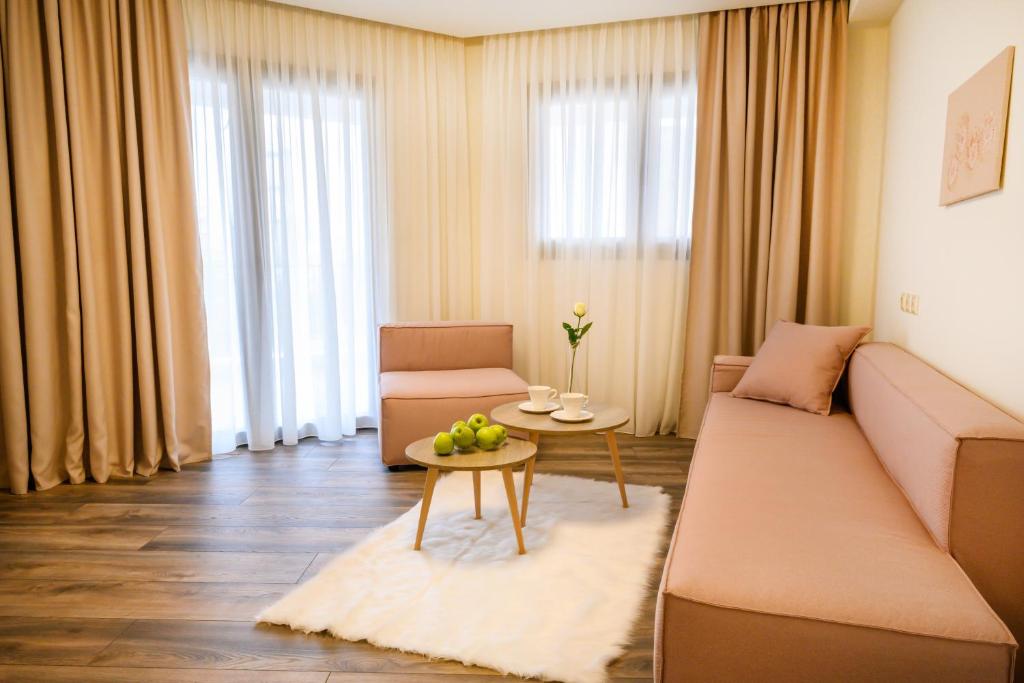 A seating area at Emerald Suites