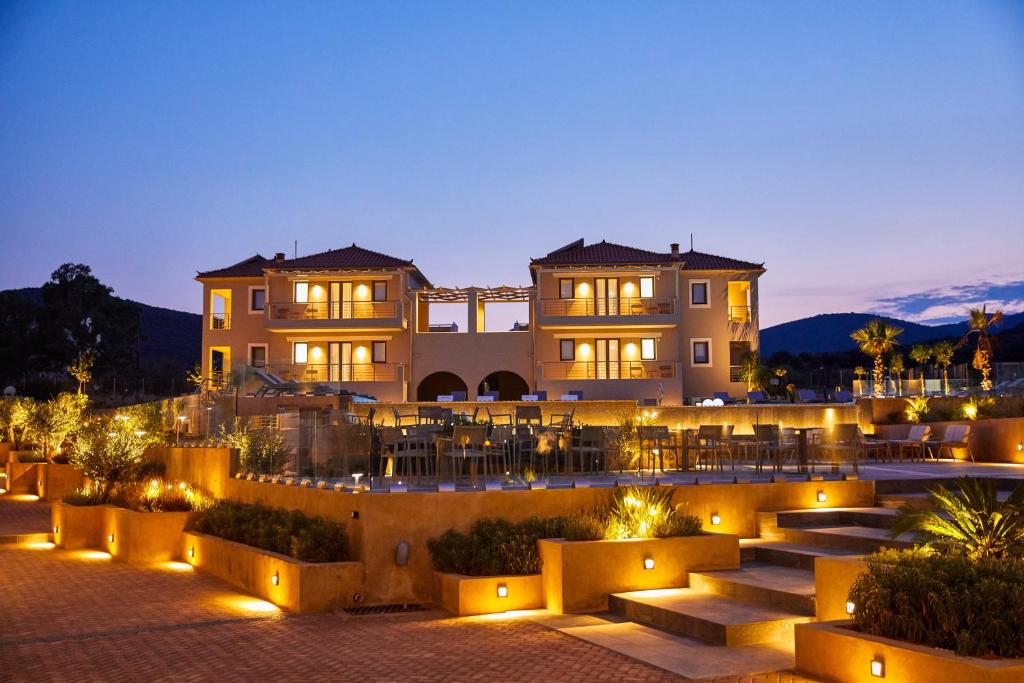 a view of a building at night with lights at Sempre Viva Suites in Monemvasia