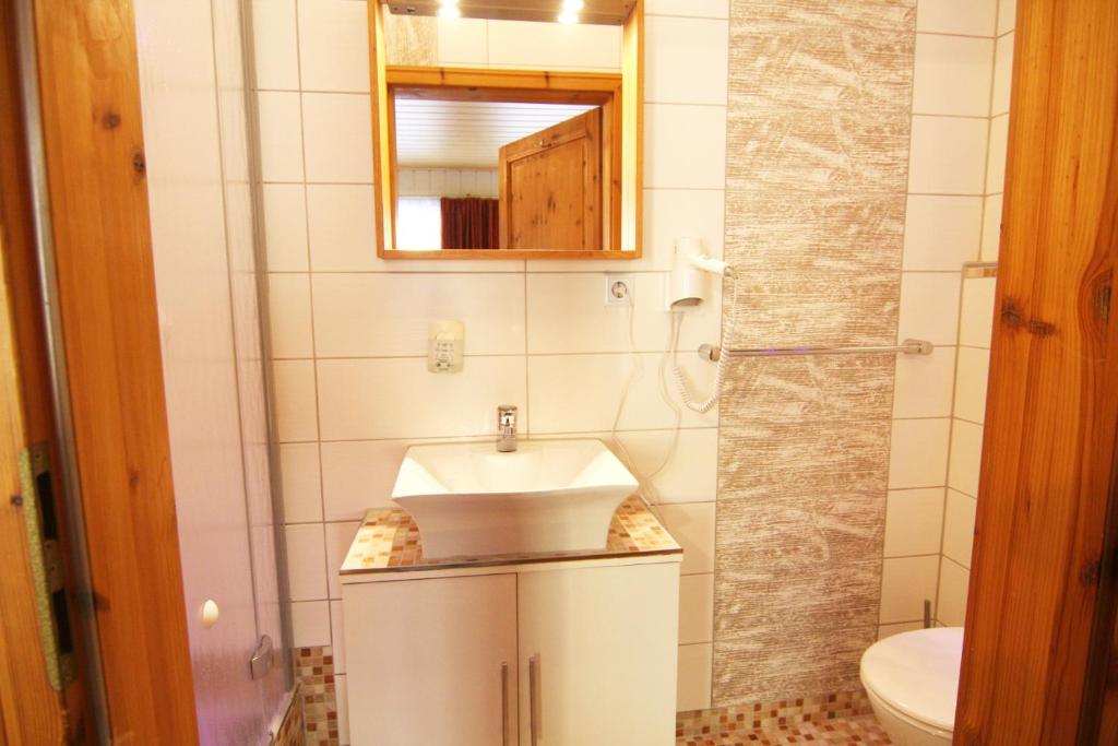 Koupelna v ubytování Esprit Hotel