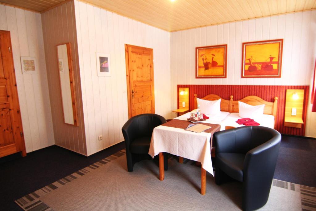 Postel nebo postele na pokoji v ubytování Esprit Hotel