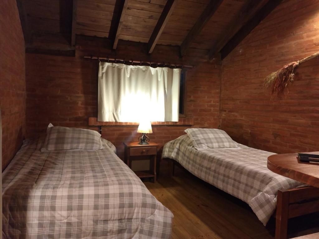 
Una cama o camas en una habitación de Hojarrasca
