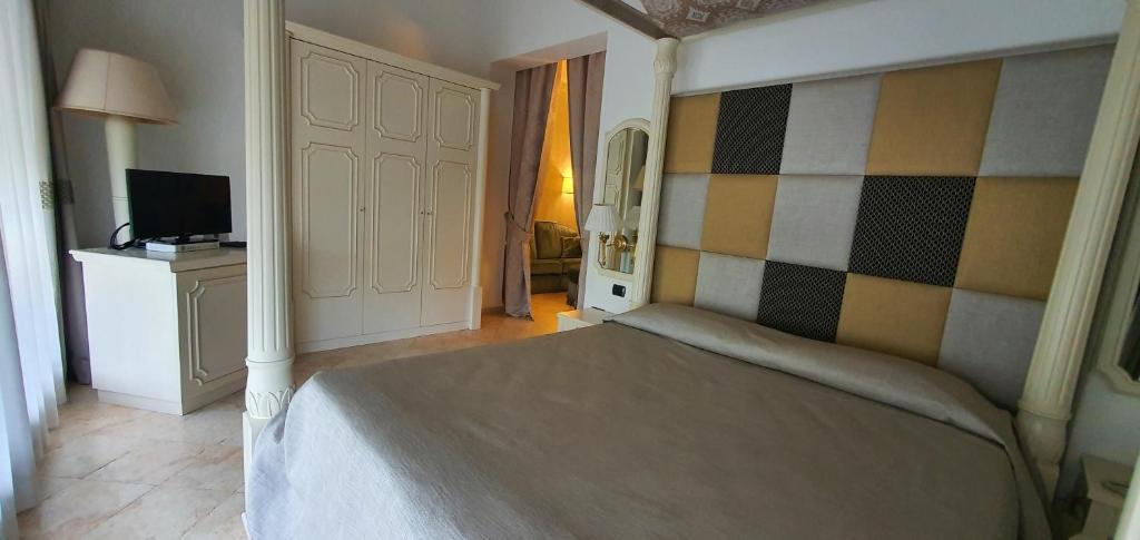 Postel nebo postele na pokoji v ubytování Hotel Classensis