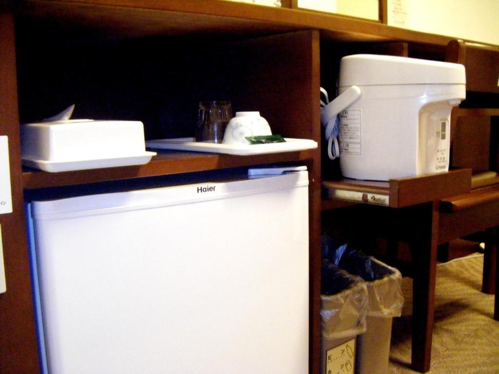 Kuchyň nebo kuchyňský kout v ubytování Hotel Route-Inn Shin Gotemba Inter -Kokudo 246 gou-