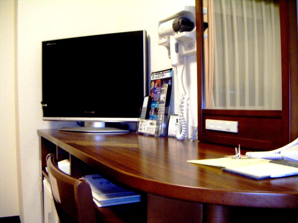 TV a/nebo společenská místnost v ubytování Hotel Route-Inn Shin Gotemba Inter -Kokudo 246 gou-