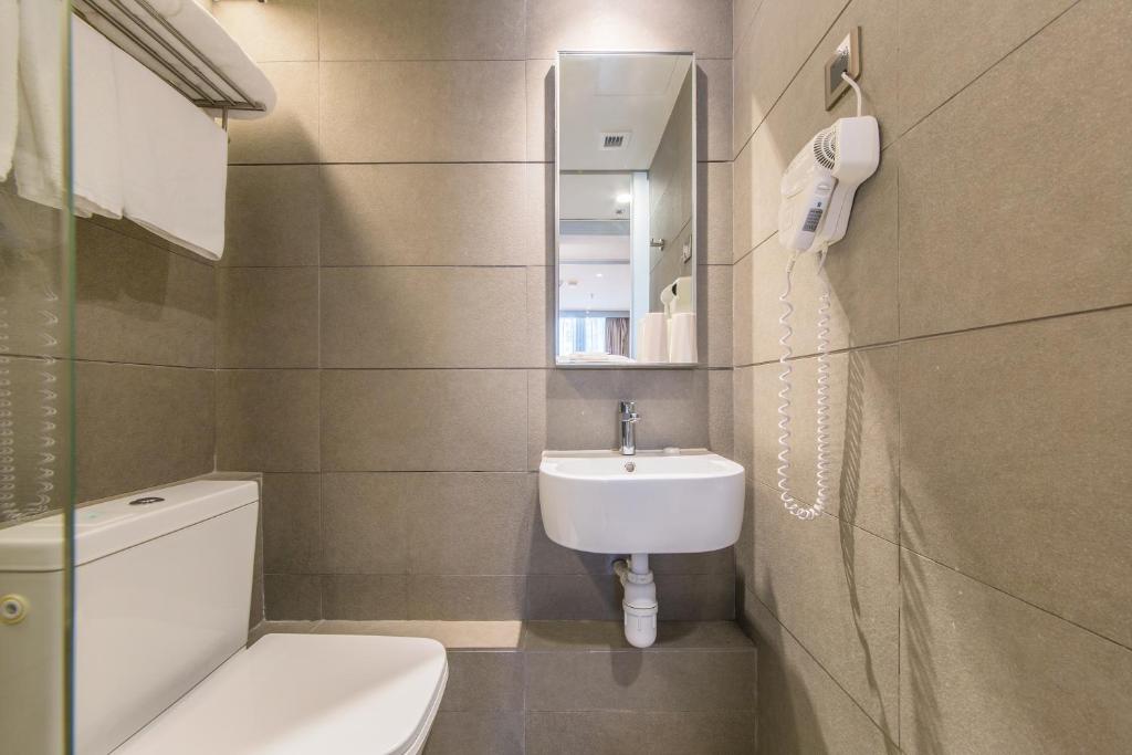 A bathroom at Lumine Hotel