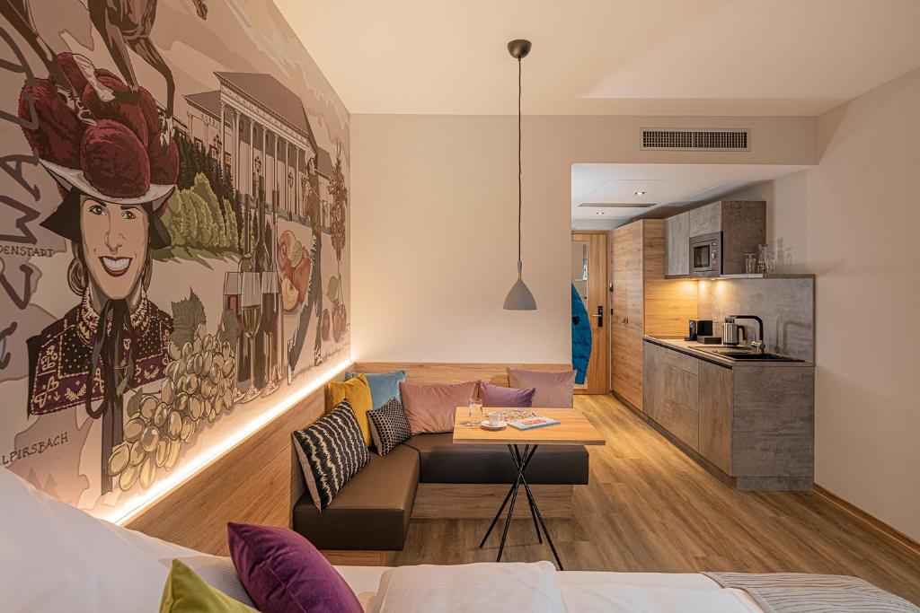 Kuchyň nebo kuchyňský kout v ubytování ADORO Aparthotel