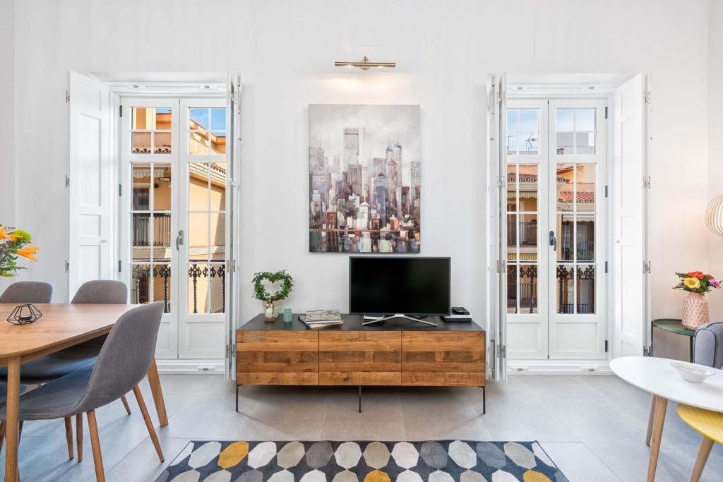 Telewizja i/lub zestaw kina domowego w obiekcie Casapalma Apartment in Malaga by Solaga Holiday Homes