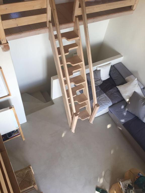 Postel nebo postele na pokoji v ubytování deep blue villas, Serifos