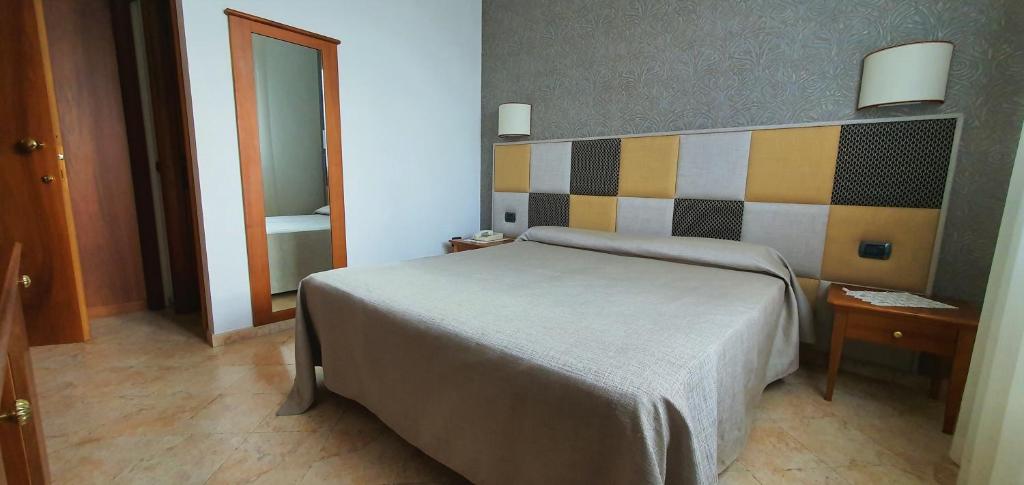Postel nebo postele na pokoji v ubytování Hotel Classensis