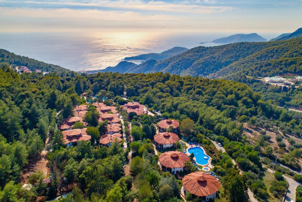 an aerial view of a resort in the mountains at Montana Pine Resort - All Inclusive in Oludeniz