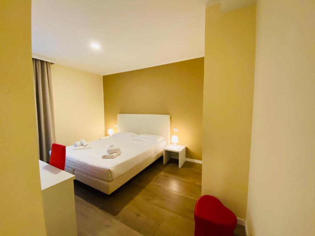 Postel nebo postele na pokoji v ubytování Verona Enjoy