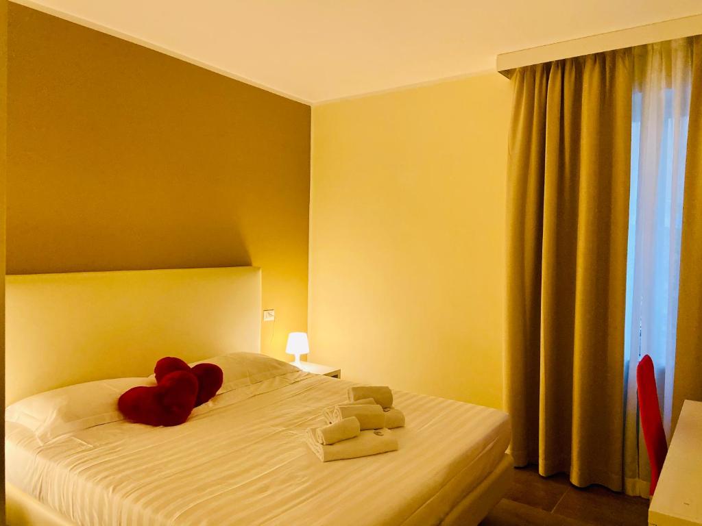 Postel nebo postele na pokoji v ubytování Verona Enjoy
