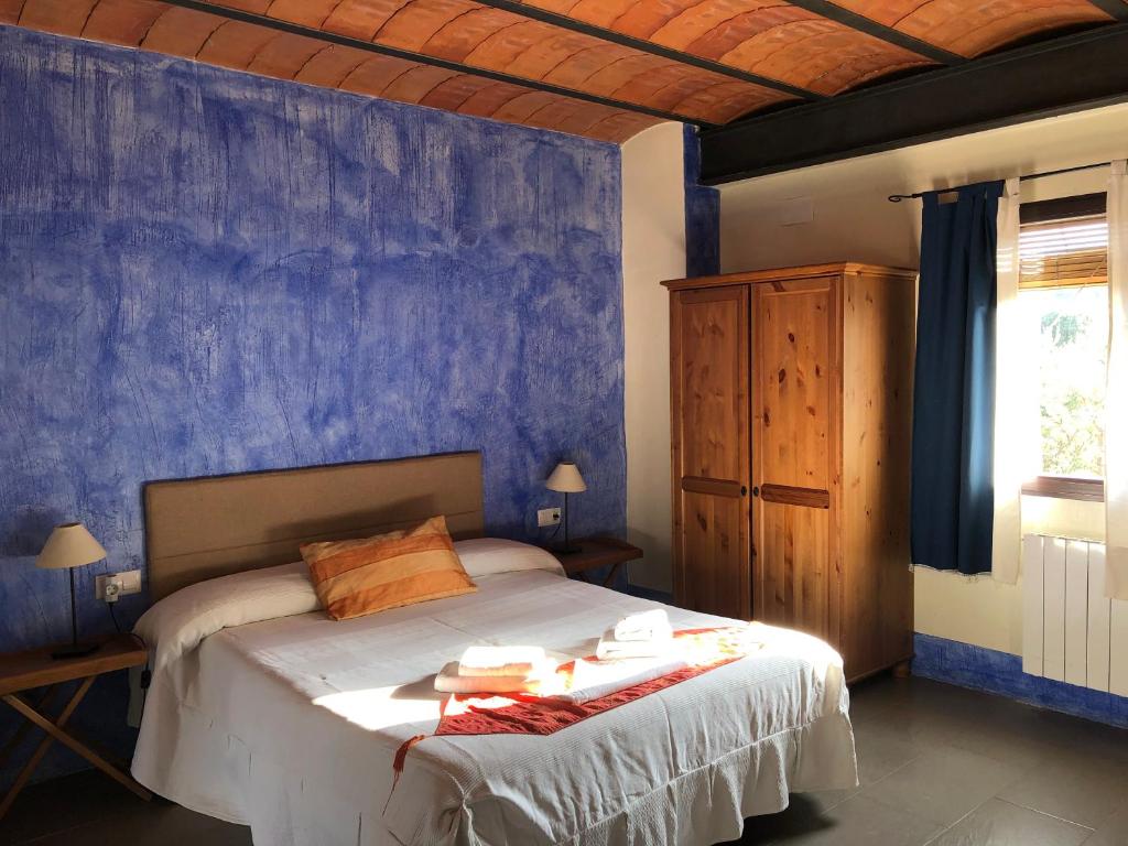 Łóżko lub łóżka w pokoju w obiekcie Hotel Finca Aldabra