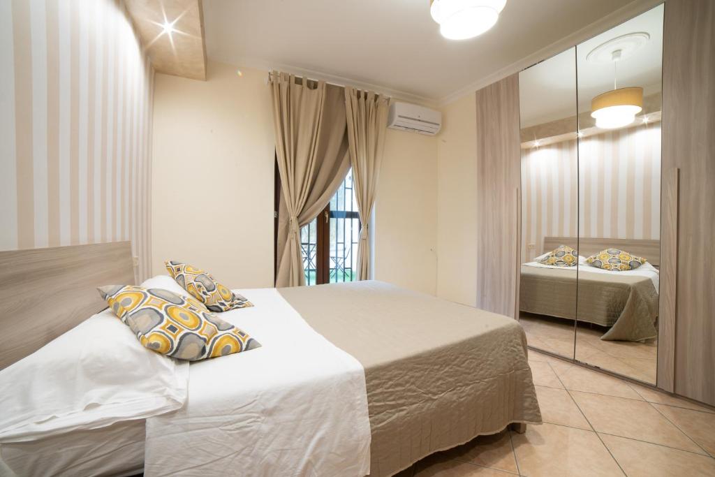 Postel nebo postele na pokoji v ubytování B&B del Sole
