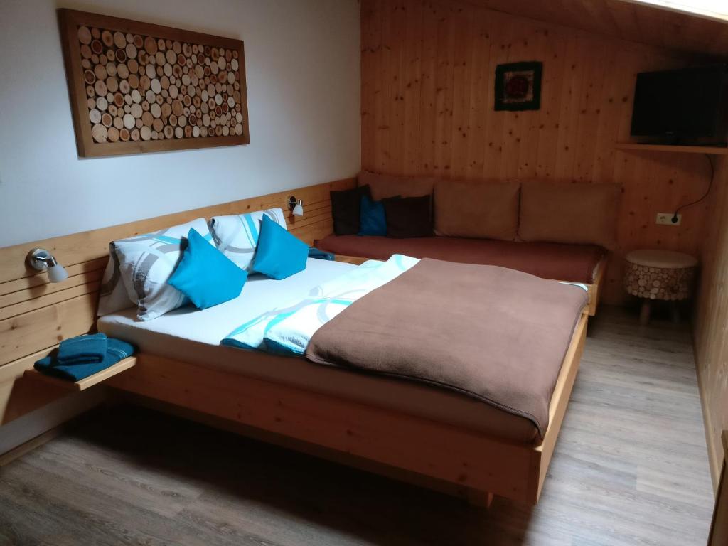 Posteľ alebo postele v izbe v ubytovaní Appartement Catrin mit Sauna und E-Ladestation