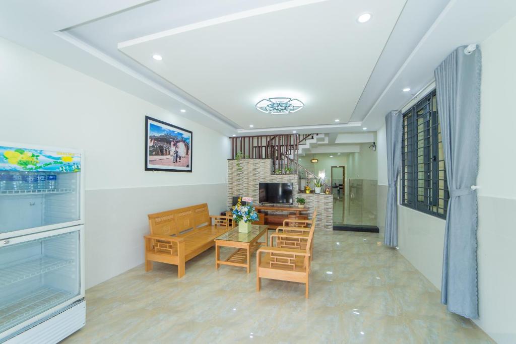 TV a/nebo společenská místnost v ubytování Coco Village Homestay Hoi An