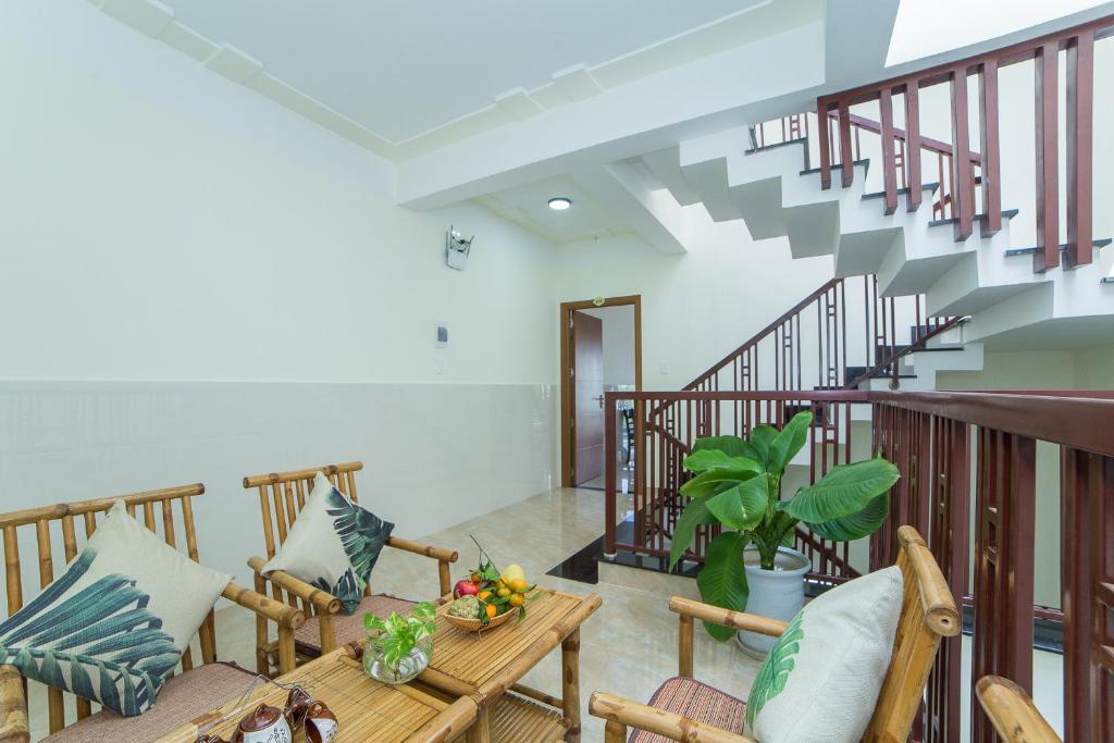 Posezení v ubytování Coco Village Homestay Hoi An