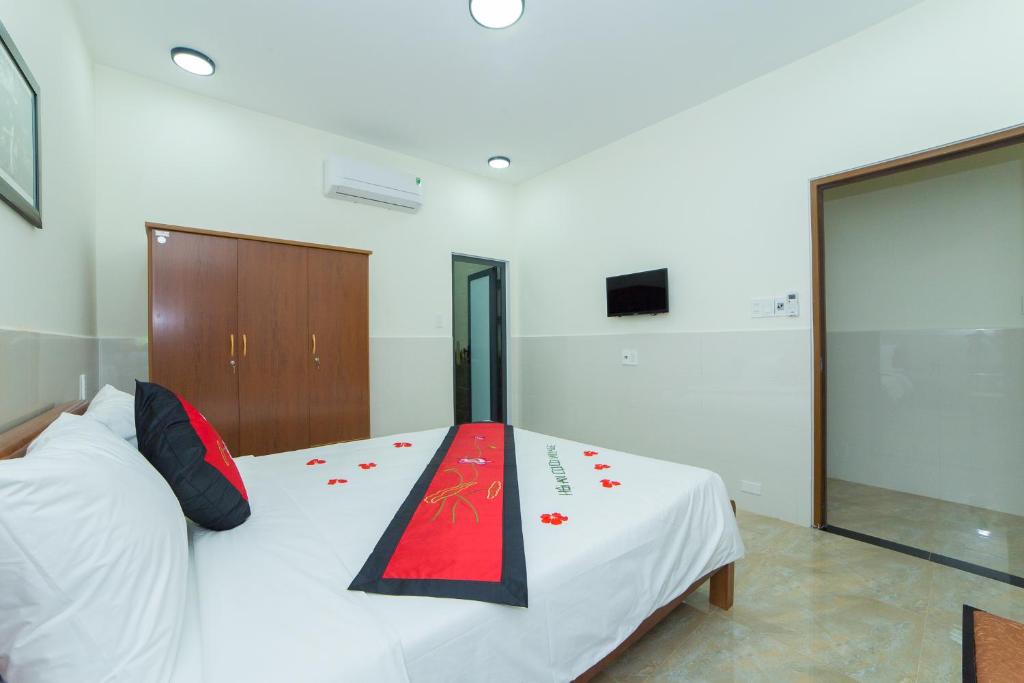 Postel nebo postele na pokoji v ubytování Coco Village Homestay Hoi An