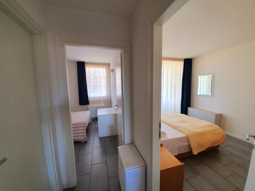 Posteľ alebo postele v izbe v ubytovaní Residence Hotel Hungaria