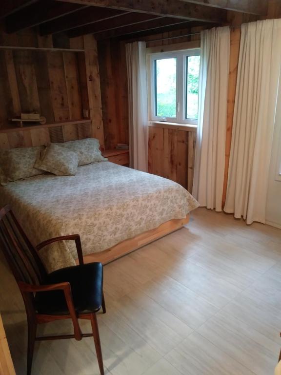 Postel nebo postele na pokoji v ubytování Au Vieux Foyer
