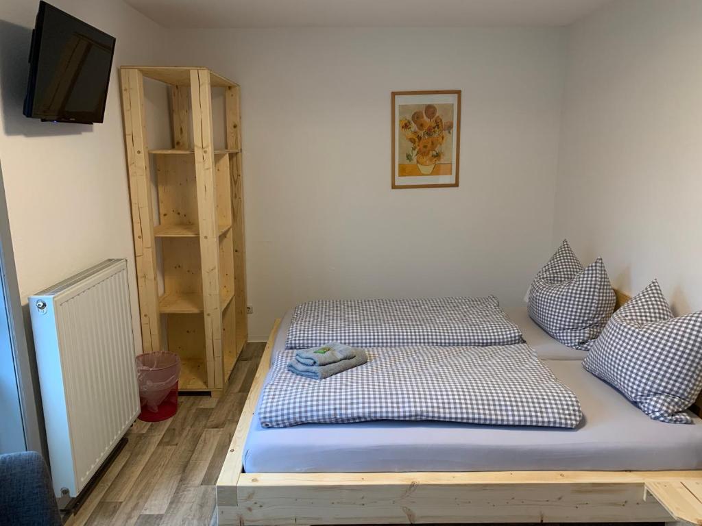 Postel nebo postele na pokoji v ubytování Landgasthof Wetteraperle