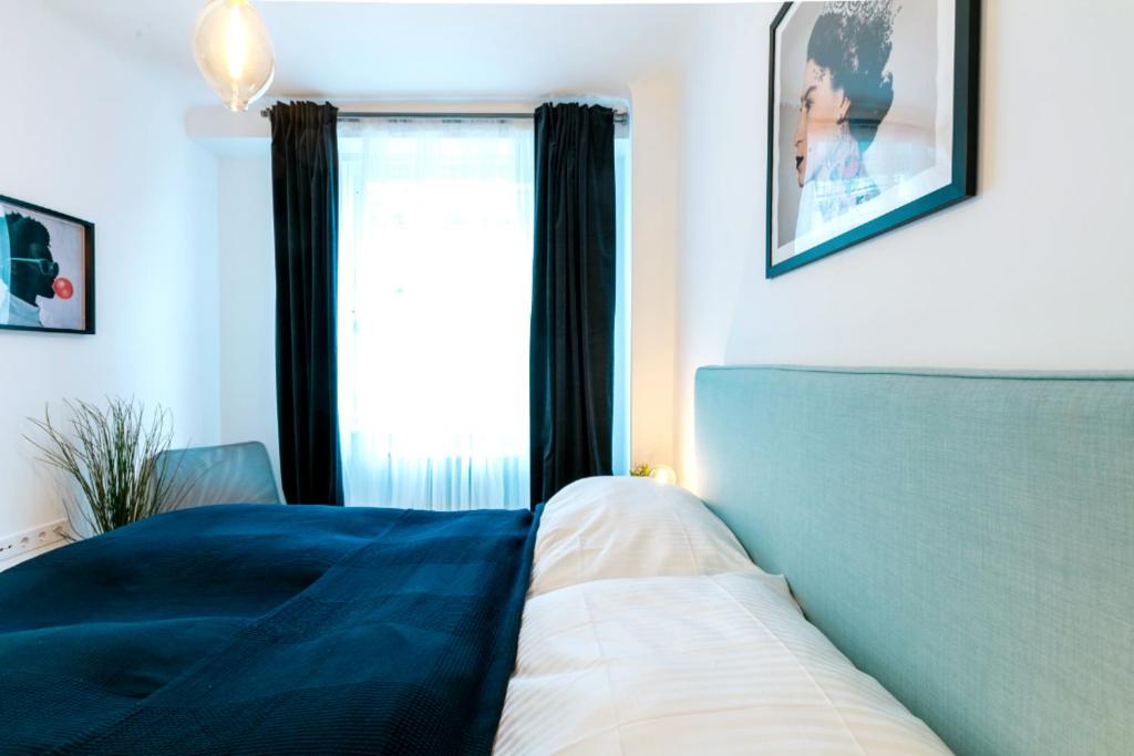 Postel nebo postele na pokoji v ubytování Vienna Elegance Apartment
