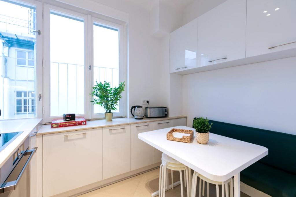 Kuchyň nebo kuchyňský kout v ubytování Vienna Elegance Apartment