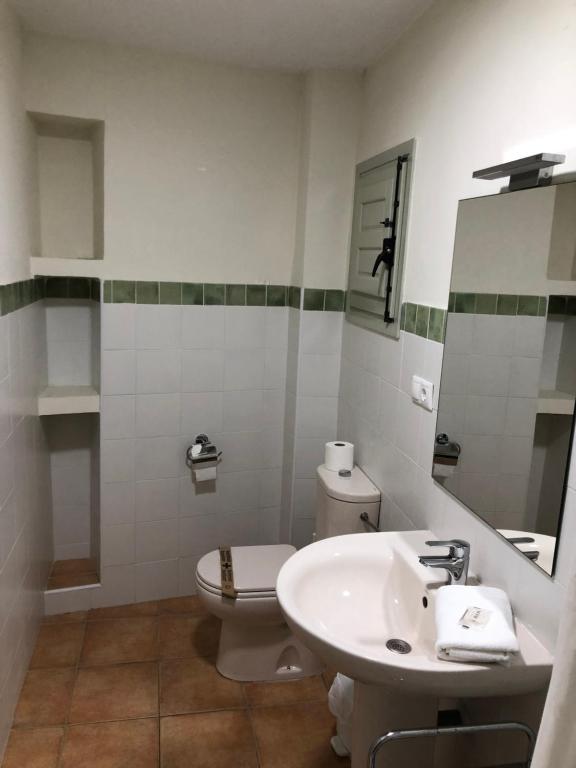 A bathroom at Apartamentos Villaaltea - Bella