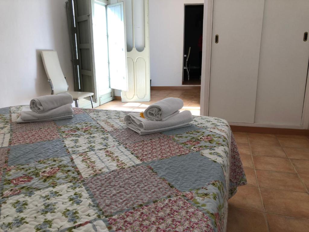 A bed or beds in a room at Apartamentos Villaaltea - Bella